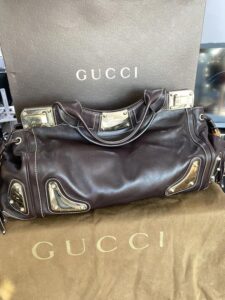 Gucci large leather tassle bag 